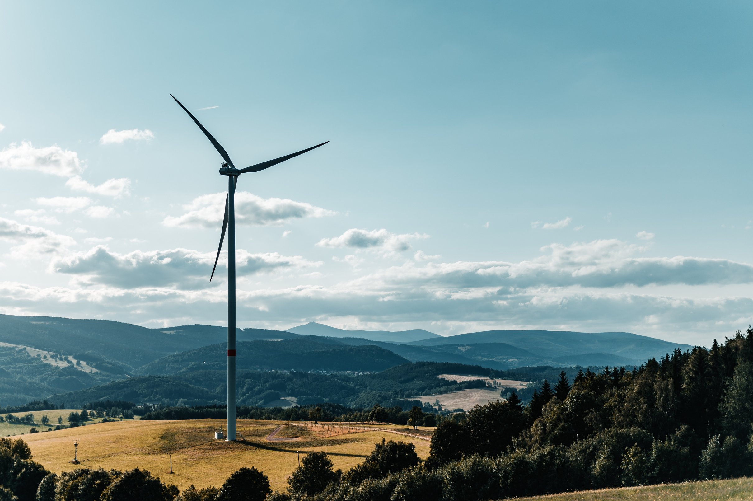 Wind Mill on Green Grass Field